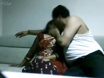 Indian Shop Employee cheats on her husband with her boss on the sofa