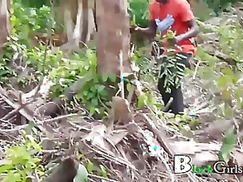 Dark-hued chick having casual lovemaking in the nature